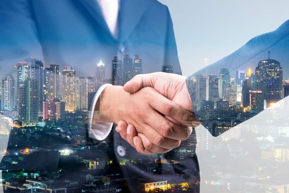 a close-up of a handshake for partnership in Third-Party Logistics Services.